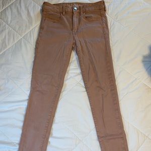 Salmon colored skinny jeans. AE brand.